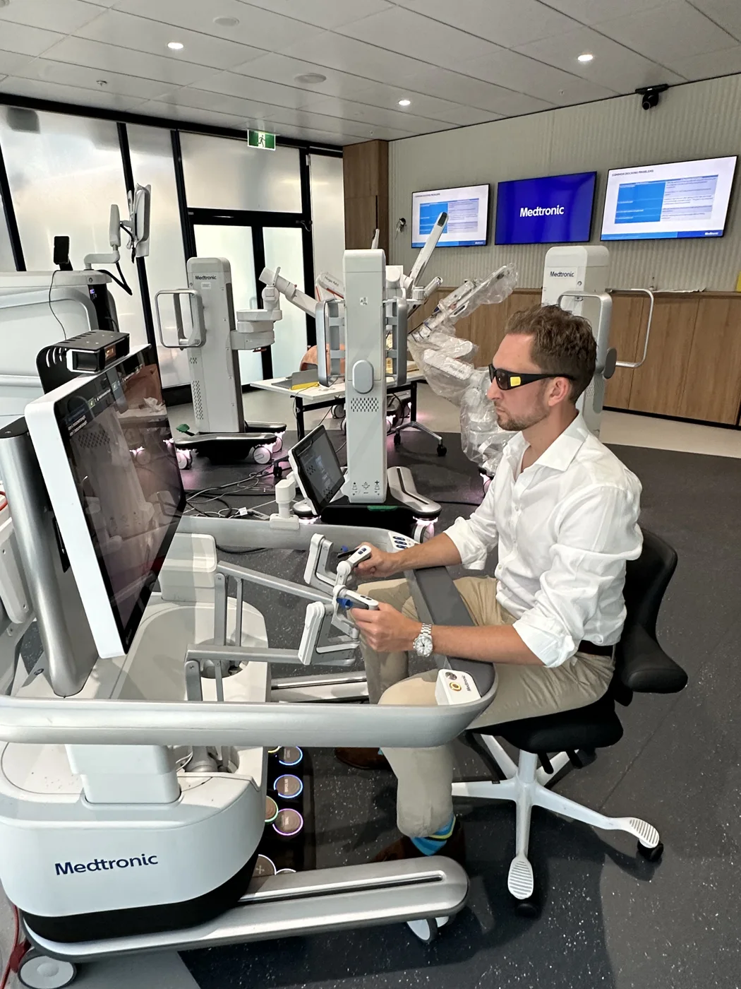 Mr Steve Lindley at a robotic surgery training console
